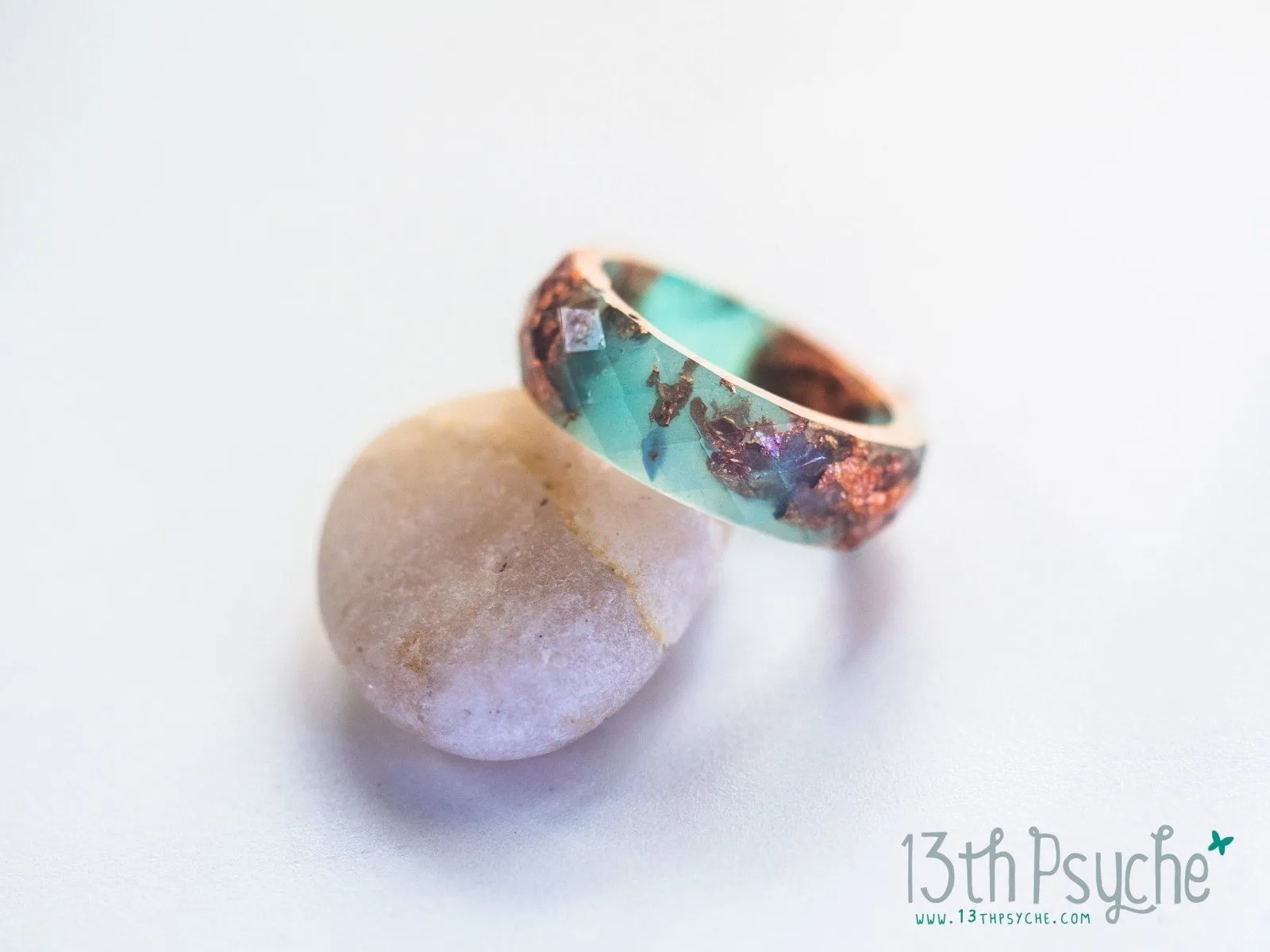 Aqua faceted resin ring with rose gold flakes