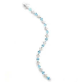 Blue Topaz Tennis Bracelet in 14k White Gold