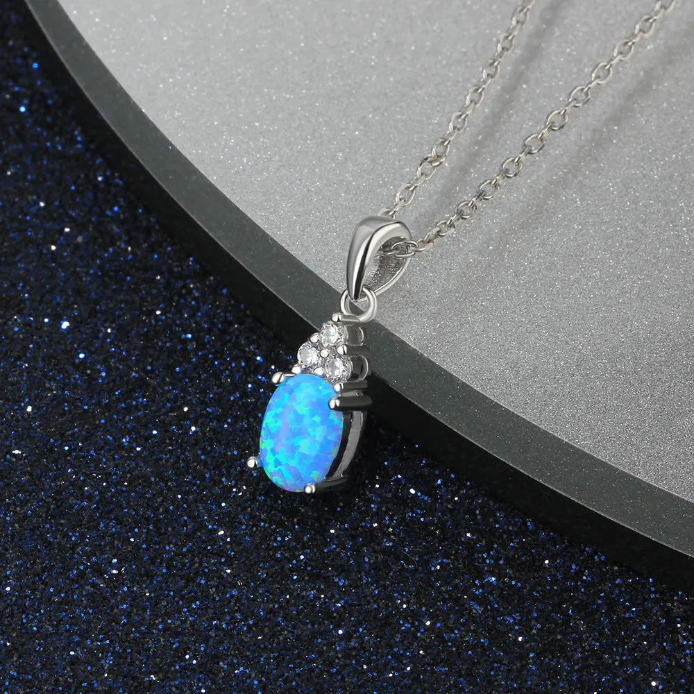 Oval Blue Opal with Three Small Zircon Sterling Silver Necklace