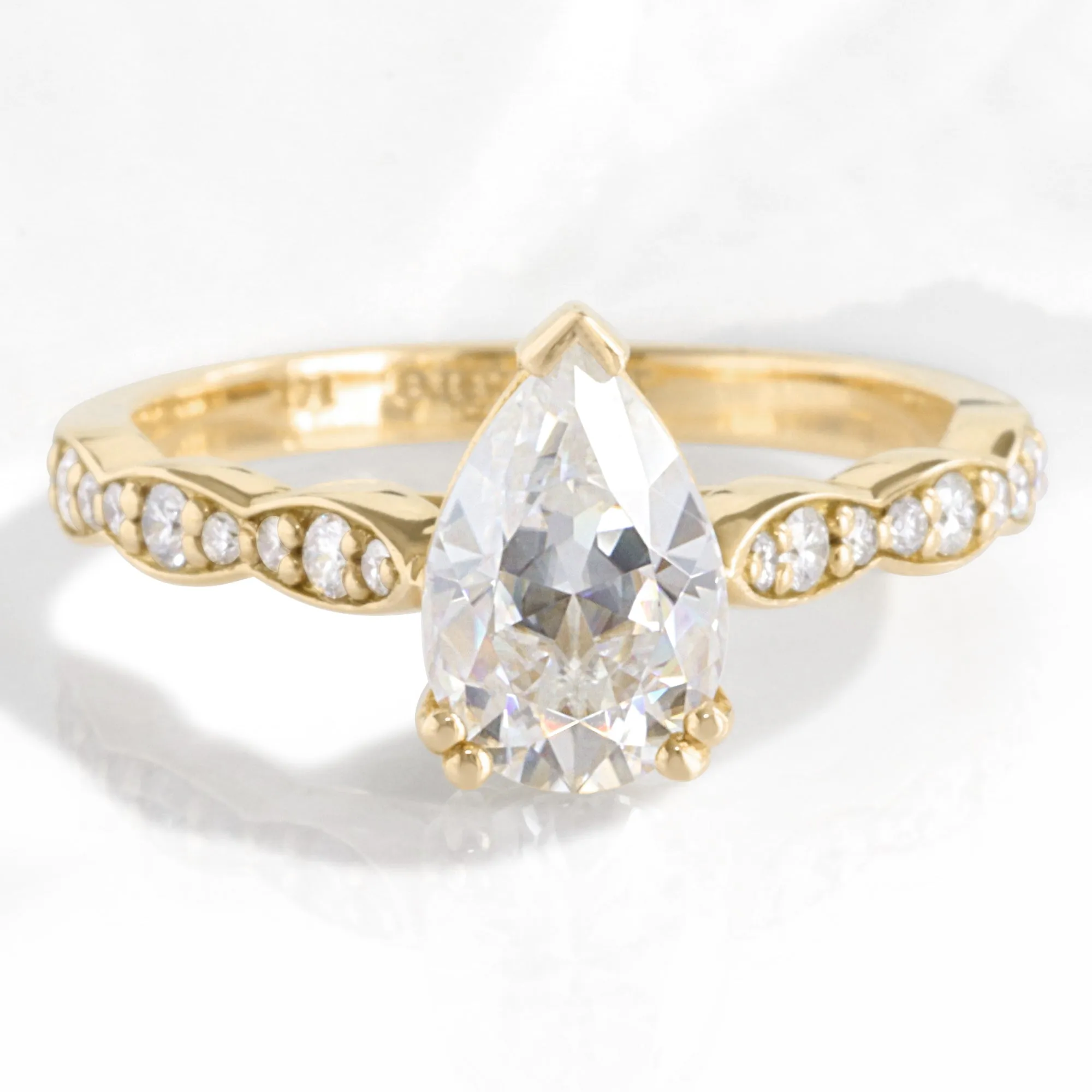 Pear Moissanite Engagement Ring in Grace Solitaire Diamond Ring