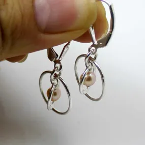 pink pearl orbit earrings