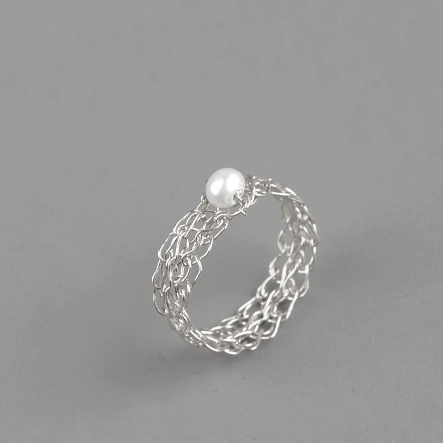 Silver ring with a pearl