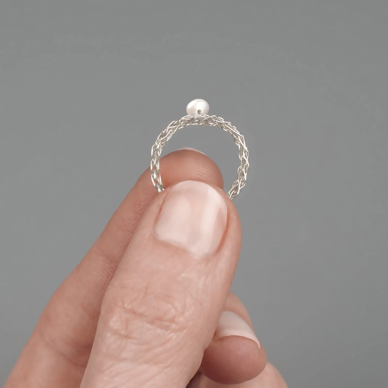 Silver ring with a pearl