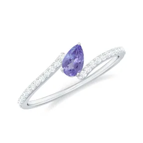 Tilted Pear Shape Tanzanite and Diamond Bypass Promise Ring