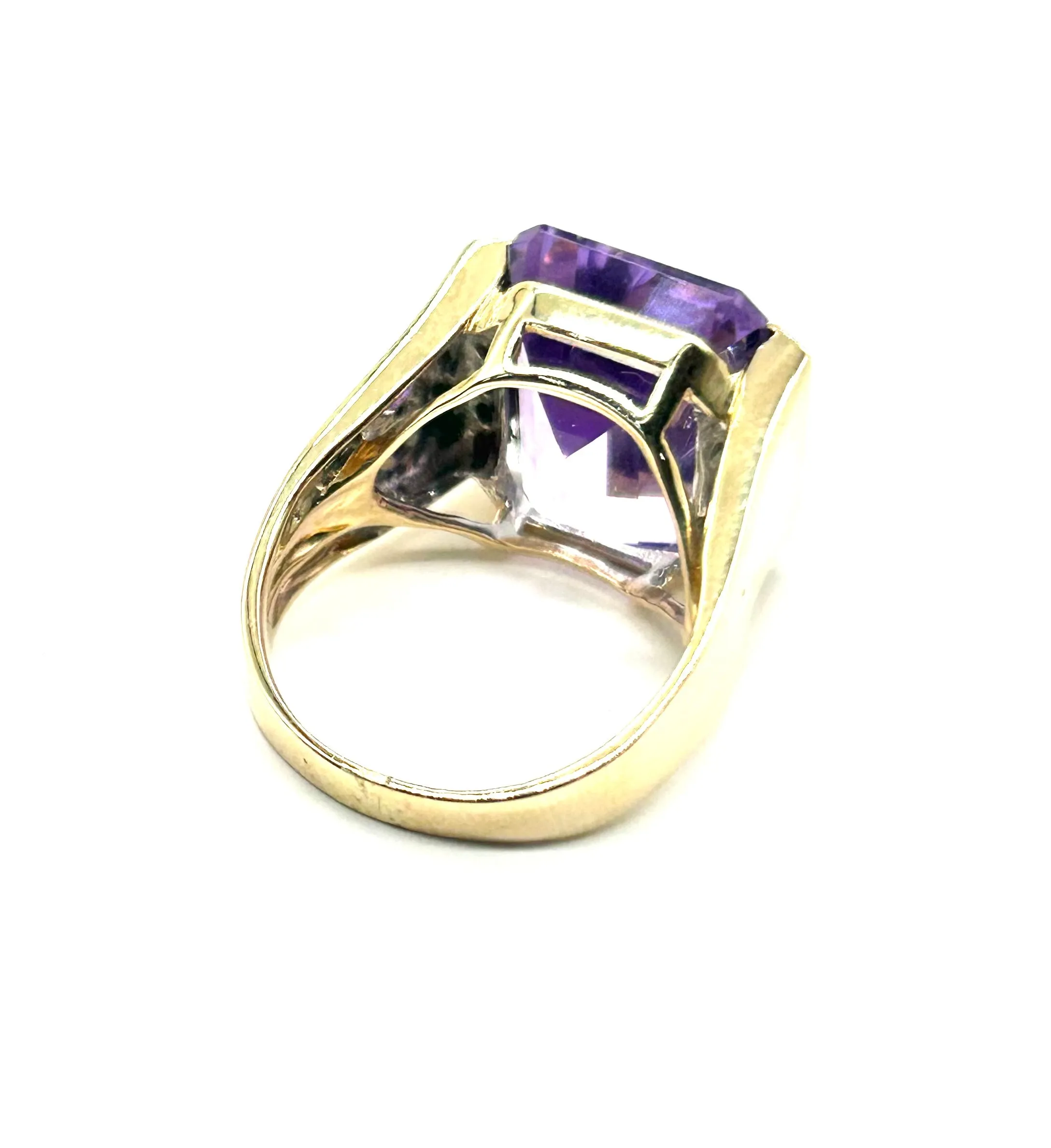 Women’s Emerald Cut Amethyst & Diamond Cathedral Ring.